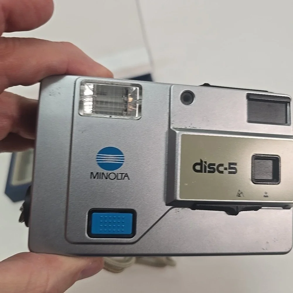 Minolta Disc‎ 5 Disc Film Camera, silver, with Case